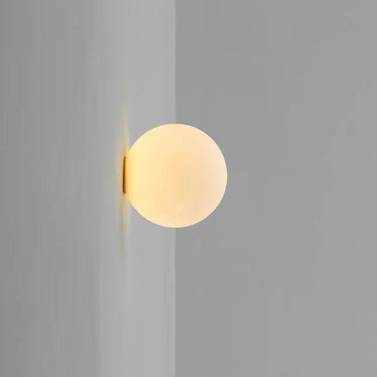 Ball Minimalist Designer Model Glass Wall Lamp featured in Frosted vs Clear Glass Wall Sconce: Which Wins?