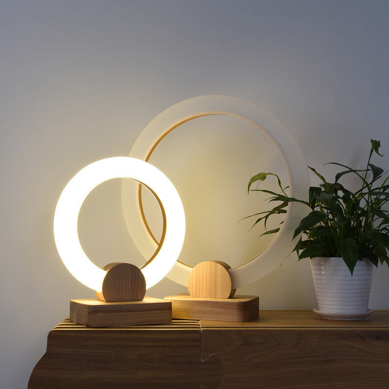Nord Circle wooden circular LED chandelier for a dining area