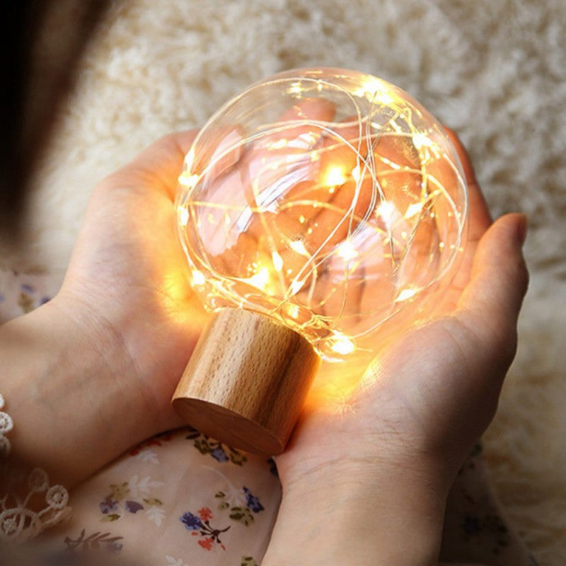 Crystal Ball LED fairy light lamp with warm lights inside a clear dome
